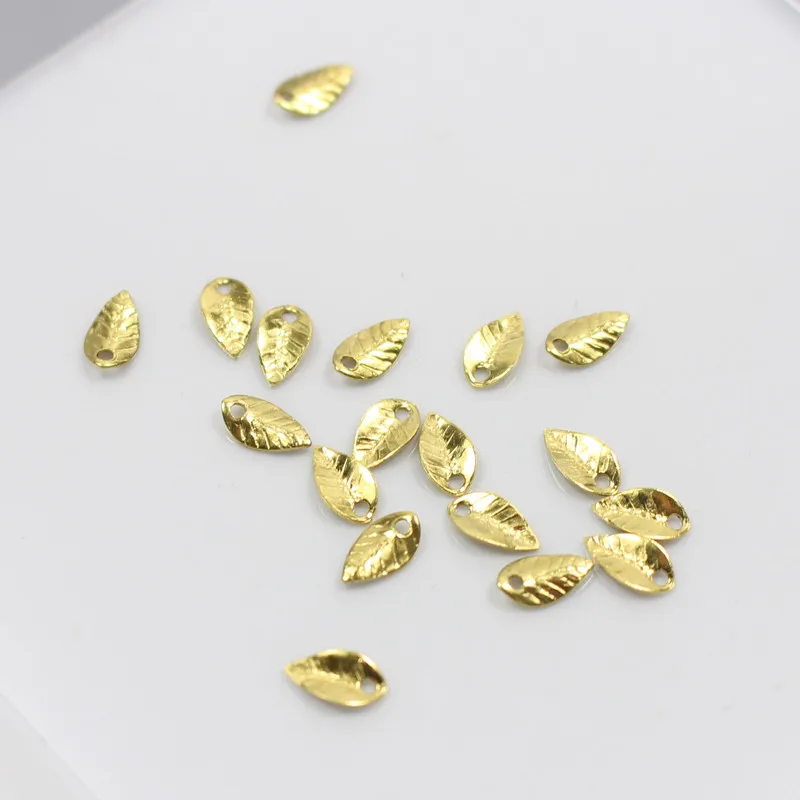 Brass Gold color small leaf spacer floating small leaves drop Beads for making jewelry accessories 4 * 7mm 100 pcs
Brass Gold color small leaf spacer floating small leaves drop Beads for making jewelry accessories 4 * 7mm 100 pcs