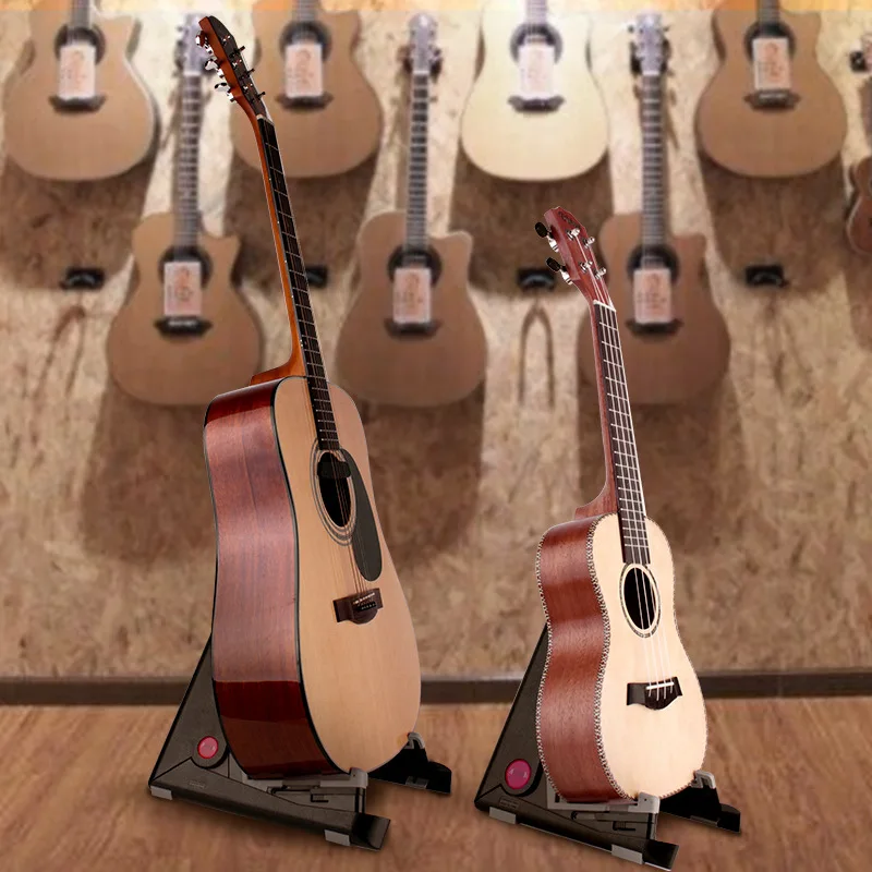 A-folding guitar stand ukulele sitting violin triangle structure silicone fit protection guitar stand instrument frame
A-folding guitar stand ukulele sitting violin triangle structure silicone fit protection guitar stand instrument frame