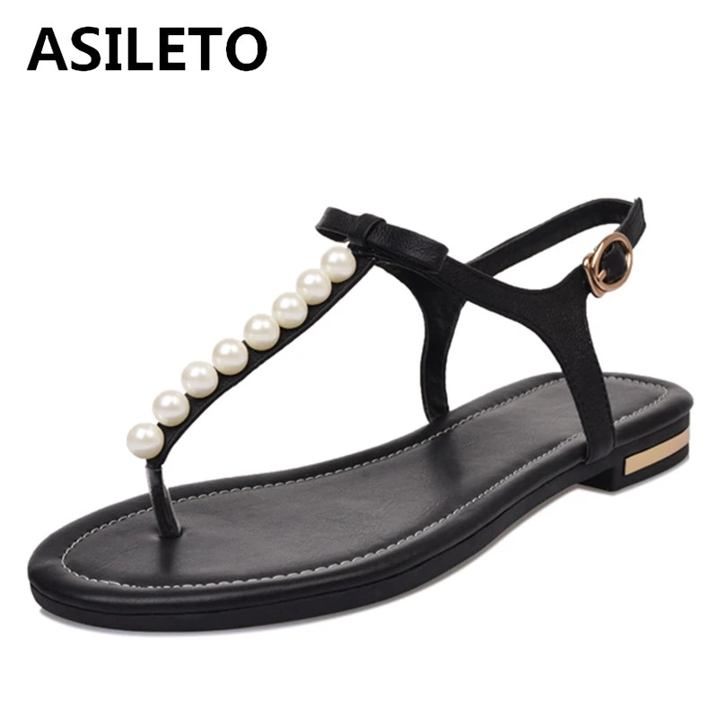 ASILETO Women flat sandals black white female rivet shoes casual sandals beading pearl ladies shoes T Bar Straps shoes RL2368t
ASILETO Women flat sandals black white female rivet shoes casual sandals beading pearl ladies shoes T Bar Straps shoes RL2368t