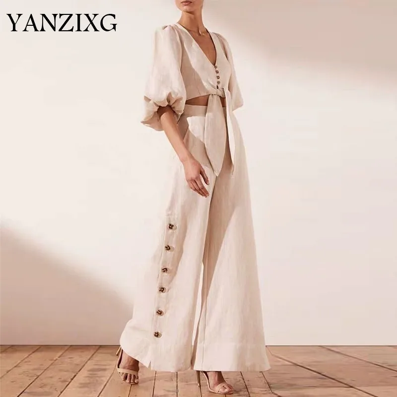 Casual Solid Women Two Piece Set V Neck Lantern Sleeve Button Criss Hem With Button Fly High Waist Wide Leg Pants Set E240
Casual Solid Women Two Piece Set V Neck Lantern Sleeve Button Criss Hem With Button Fly High Waist Wide Leg Pants Set E240