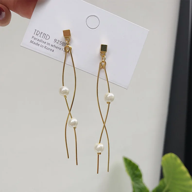 Simple Gold color curve line tassel drop earrings for women, fashion simulated pearl dangle earings long fashion jewelry 2019
Simple Gold color curve line tassel drop earrings for women, fashion simulated pearl dangle earings long fashion jewelry 2019