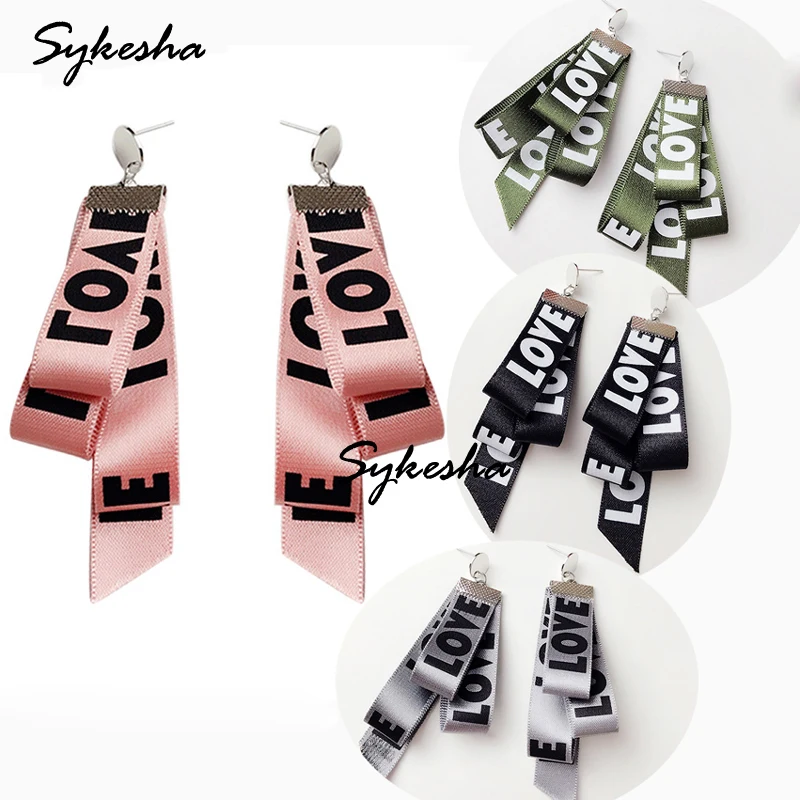 2019 Hot Selling Fashion Jewelry Korean Exaggerated Big Letter Ribbon Tape Long Tassel Stud Earrings For Women Gift
2019 Hot Selling Fashion Jewelry Korean Exaggerated Big Letter Ribbon Tape Long Tassel Stud Earrings For Women Gift