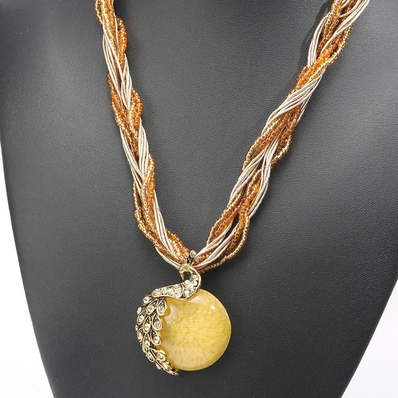 Exquisite Ethnic Jewelry Bohemian Colorful Women Beads Stone Peacock Pendant Necklace with Multilayer Chain Turkish Jewelry
Exquisite Ethnic Jewelry Bohemian Colorful Women Beads Stone Peacock Pendant Necklace with Multilayer Chain Turkish Jewelry