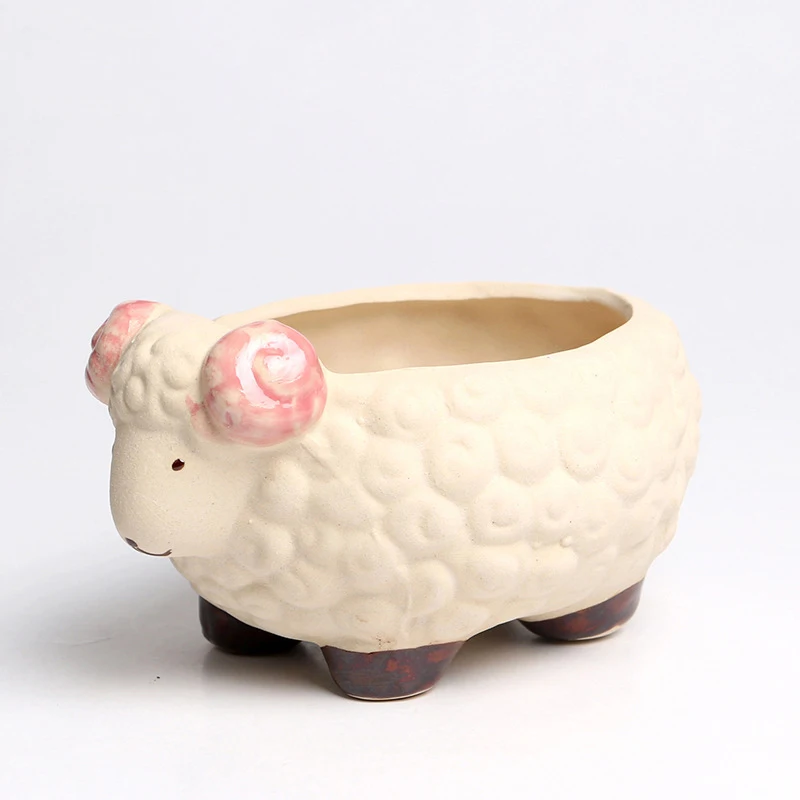 2018 Su-pottery hand-painted sheep modeling flower pot Succulents pot simple stone ceramic creative ceramic ornaments
2018 Su-pottery hand-painted sheep modeling flower pot Succulents pot simple stone ceramic creative ceramic ornaments