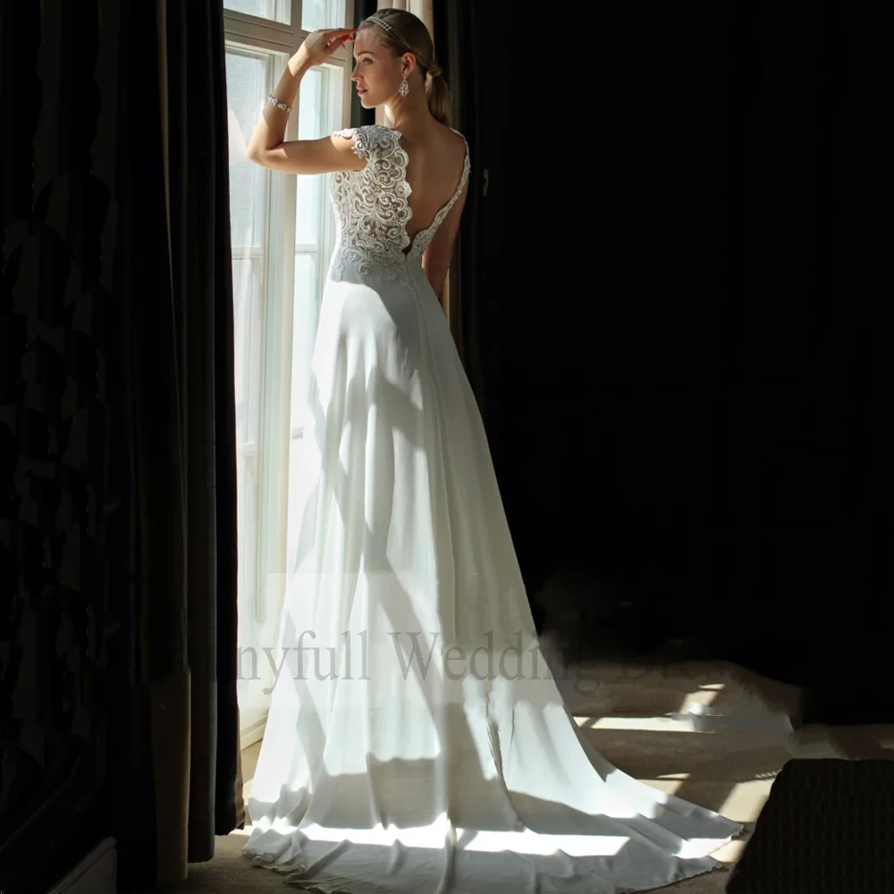 Exclusive Luxury Lace Wedding Dress Chiffon A Line Cap Sleeve Backless Wedding Dress Beach Bridal Gown Vestido De Noiva
Exclusive Luxury Lace Wedding Dress Chiffon A Line Cap Sleeve Backless Wedding Dress Beach Bridal Gown Vestido De Noiva