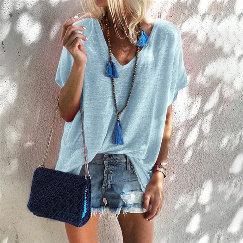 Summer casual loose large size women's T-shirt sexy V-neck short-sleeved candy color wild fashion women's tops street clothing
Summer casual loose large size women's T-shirt sexy V-neck short-sleeved candy color wild fashion women's tops street clothing