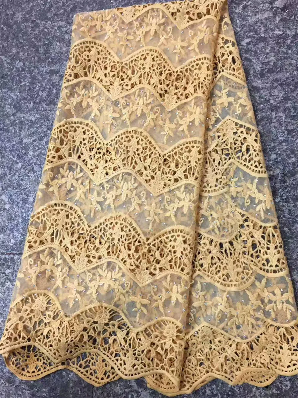 embroidered gold color tulle lace fabric high quality french net lace fabric with stones
embroidered gold color tulle lace fabric high quality french net lace fabric with stones