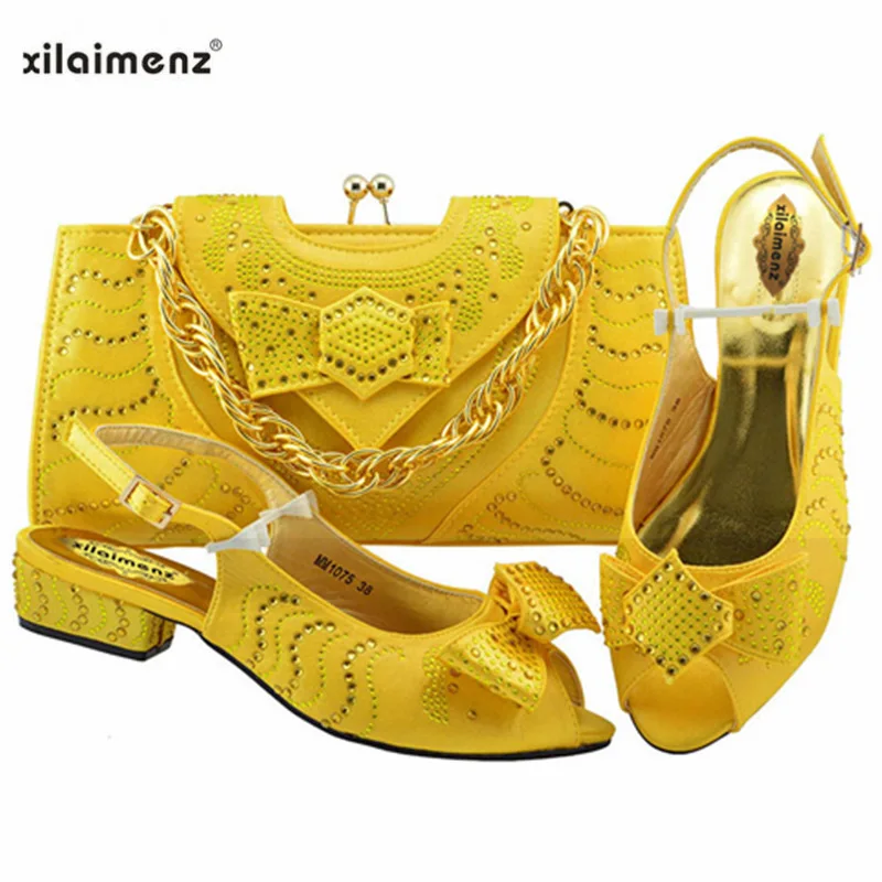 40% Discount Yellow Color African Ladies Autumn Hot Sale Shoes Matching Bag With Crystal For Dress And Party Italian Shoes 
40% Discount Yellow Color African Ladies Autumn Hot Sale Shoes Matching Bag With Crystal For Dress And Party Italian Shoes
