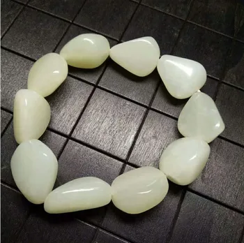Natural seeds of Xinjiang Hetian jade seed Carved white beads Jade hand string 
Natural seeds of Xinjiang Hetian jade seed Carved white beads Jade hand string