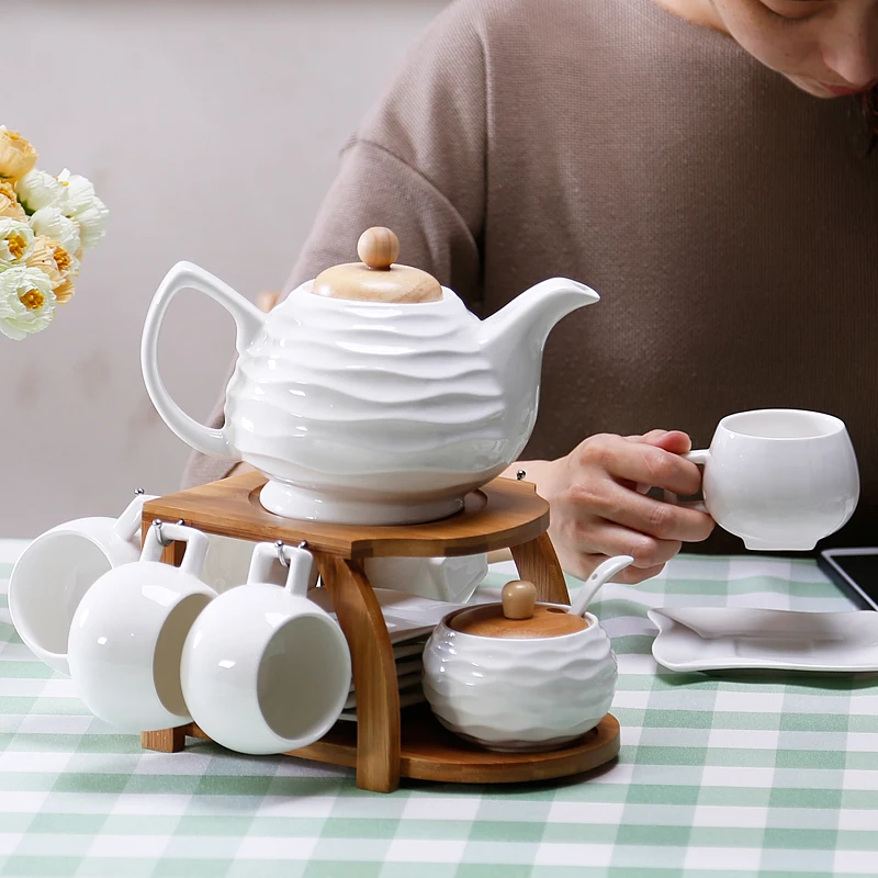 Ceramic cups coffee pots European-style bamboo-wooden frame coffee tea sets coffee pod holder porcelain bone china tea sets
Ceramic cups coffee pots European-style bamboo-wooden frame coffee tea sets coffee pod holder porcelain bone china tea sets