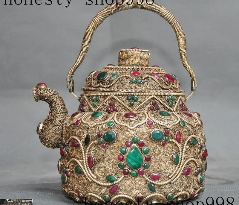 old Tibetan silver Filigree inlay gem Dynasty Palace Wine Tea Pot Teapot Flagon 
old Tibetan silver Filigree inlay gem Dynasty Palace Wine Tea Pot Teapot Flagon