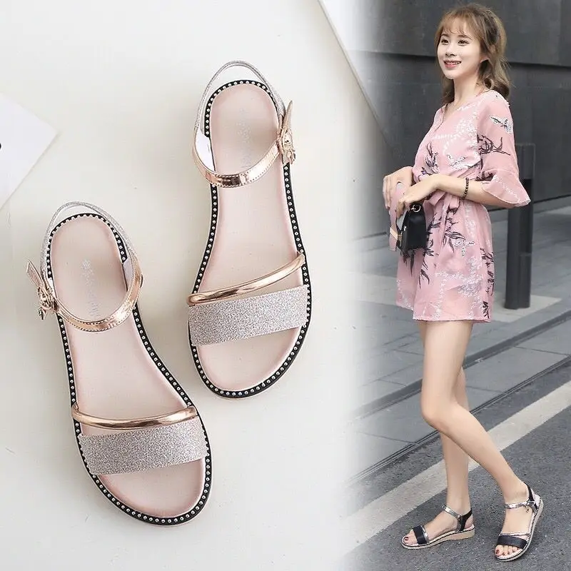 Korean version of the simple open toe flat casual sandals female summer word buckle with wild student shoes
Korean version of the simple open toe flat casual sandals female summer word buckle with wild student shoes