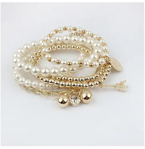 New Fashion Multilayer imitation pearl Beaded Bracelet for Women Multi-layer Elastic Gold Metal Eiffel Tower Charm Bracelet 8618
New Fashion Multilayer imitation pearl Beaded Bracelet for Women Multi-layer Elastic Gold Metal Eiffel Tower Charm Bracelet 8618
