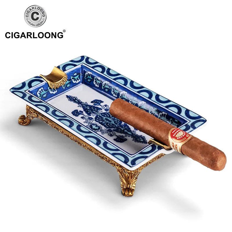 CIGARLOONG ceramic cigar fashion blue and white porcelain ashtray carved copper the base a ashtray AH-1060
CIGARLOONG ceramic cigar fashion blue and white porcelain ashtray carved copper the base a ashtray AH-1060