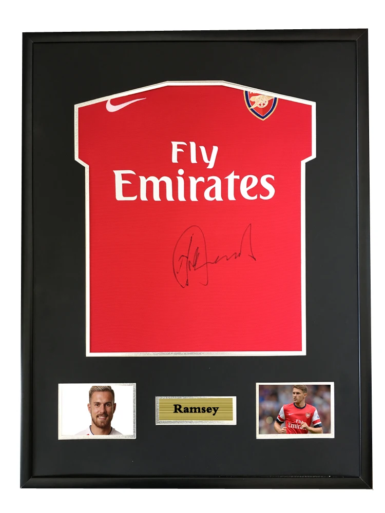 Aaron Ramsey signed autographed soccer shirt jersey come with Sa coa framed Arsenal
Aaron Ramsey signed autographed soccer shirt jersey come with Sa coa framed Arsenal