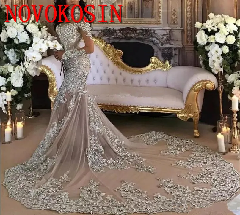 Long Sleeves Mermaid Wedding Dresses 2019 High Neck Crystal Beads Appliques Trumpet Long Train Arabic Illusion Bridal Gowns
Long Sleeves Mermaid Wedding Dresses 2019 High Neck Crystal Beads Appliques Trumpet Long Train Arabic Illusion Bridal Gowns