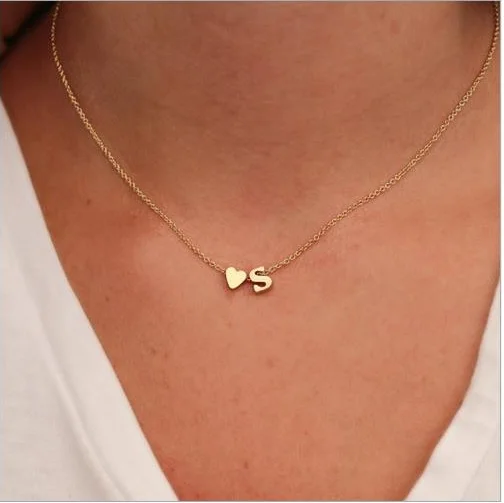 letter first name ABCDEFGHIJKLMNOPRSTUVWYZ slide with heart pendant gold color Metal plated Chain For Women Necklace gift.
letter first name ABCDEFGHIJKLMNOPRSTUVWYZ slide with heart pendant gold color Metal plated Chain For Women Necklace gift.