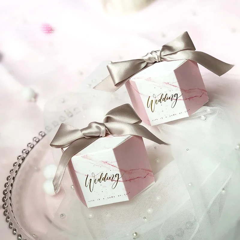50pcs Hexagonal New Pink Marble style Candy Boxes Wedding Favors Party Bomboniera Giveaways Gift Box with pink/grey ribbons
50pcs Hexagonal New Pink Marble style Candy Boxes Wedding Favors Party Bomboniera Giveaways Gift Box with pink/grey ribbons