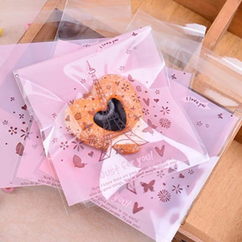 50PCS Lovely Eiffel Tower Christmas Gifts Bags Self-adhesive Bake Cookies Biscuit Candy Snack Plastic Packaging Bags Supplies
50PCS Lovely Eiffel Tower Christmas Gifts Bags Self-adhesive Bake Cookies Biscuit Candy Snack Plastic Packaging Bags Supplies
