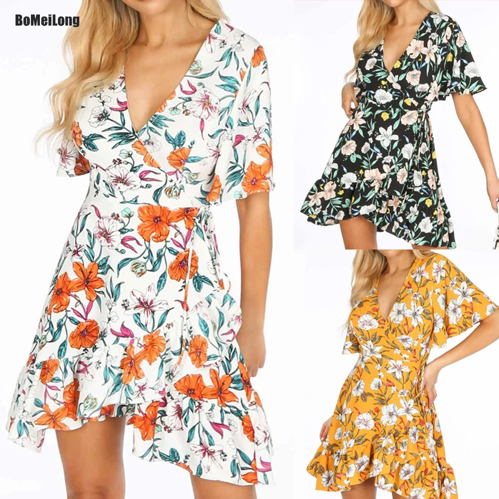 New Fashion Summer Womens Mini Dresses Boho Floral V Neck Beach Dress Flare Short Sleeve Bandage Party Ladies Robe Femme B0461
New Fashion Summer Womens Mini Dresses Boho Floral V Neck Beach Dress Flare Short Sleeve Bandage Party Ladies Robe Femme B0461
