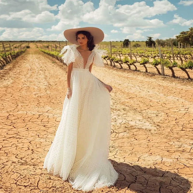 New Arrival Beach Boho Wedding Dress 2019 V Neck Backless Vestido De Noiva Tulle Lace Bow Wedding Gowns Sexy robe de mariee
New Arrival Beach Boho Wedding Dress 2019 V Neck Backless Vestido De Noiva Tulle Lace Bow Wedding Gowns Sexy robe de mariee