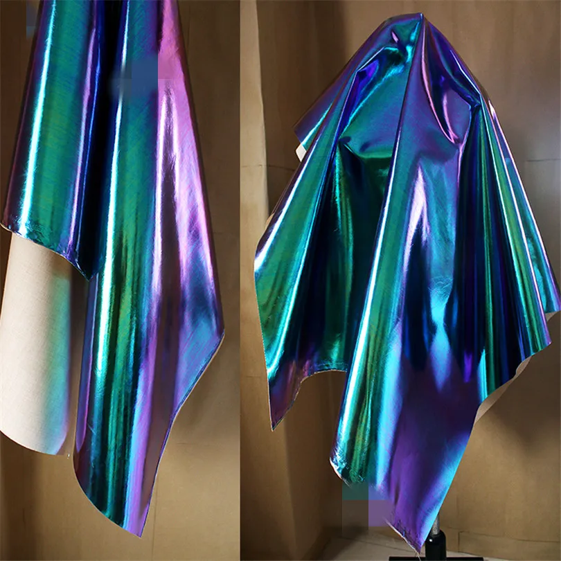45cm*145cm/piece Original tpu laser fantasy color blue and purple designer fabric clothing bag bag background autumn and winter
45cm*145cm/piece Original tpu laser fantasy color blue and purple designer fabric clothing bag bag background autumn and winter