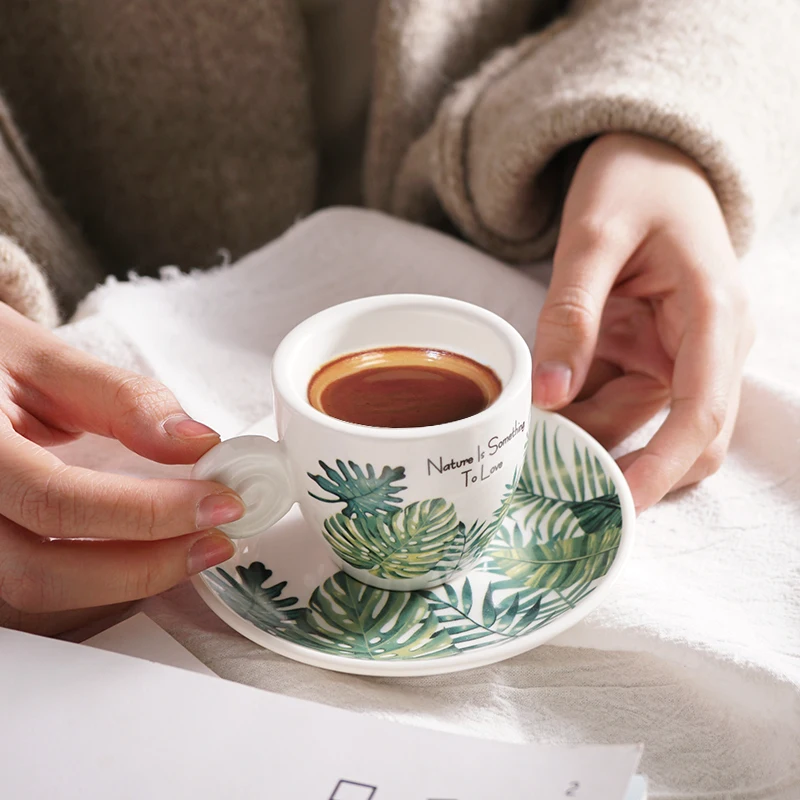 90ml egg shape Monstera pattern espresso cups saucers with Threaded handle tropical leaf design espresso cup for cafe
90ml egg shape Monstera pattern espresso cups saucers with Threaded handle tropical leaf design espresso cup for cafe