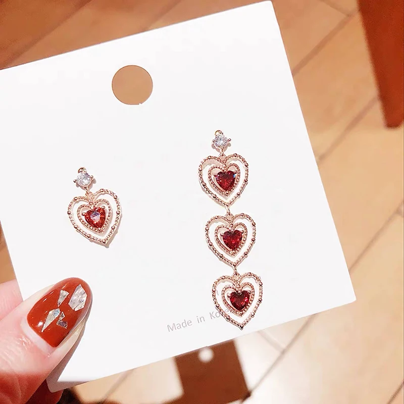 MENGJIQIAO 2019 New Sweet Red Crystal Hollow Heart Drop Earrings Mujer Moda Cute Asymmetry Oorbellen Girls Gift Ear Accessories
MENGJIQIAO 2019 New Sweet Red Crystal Hollow Heart Drop Earrings Mujer Moda Cute Asymmetry Oorbellen Girls Gift Ear Accessories