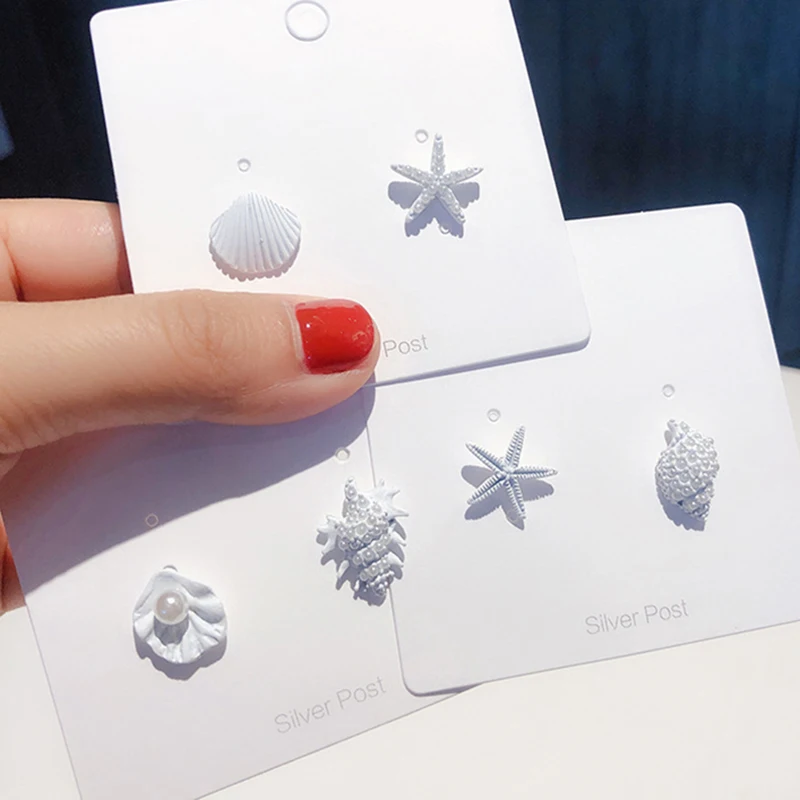 Korean Summer New White Starfish Conch Shell Asymmetric White Stud Earrings for Girl Women's Minimalist Ocean Shell Earring
Korean Summer New White Starfish Conch Shell Asymmetric White Stud Earrings for Girl Women's Minimalist Ocean Shell Earring