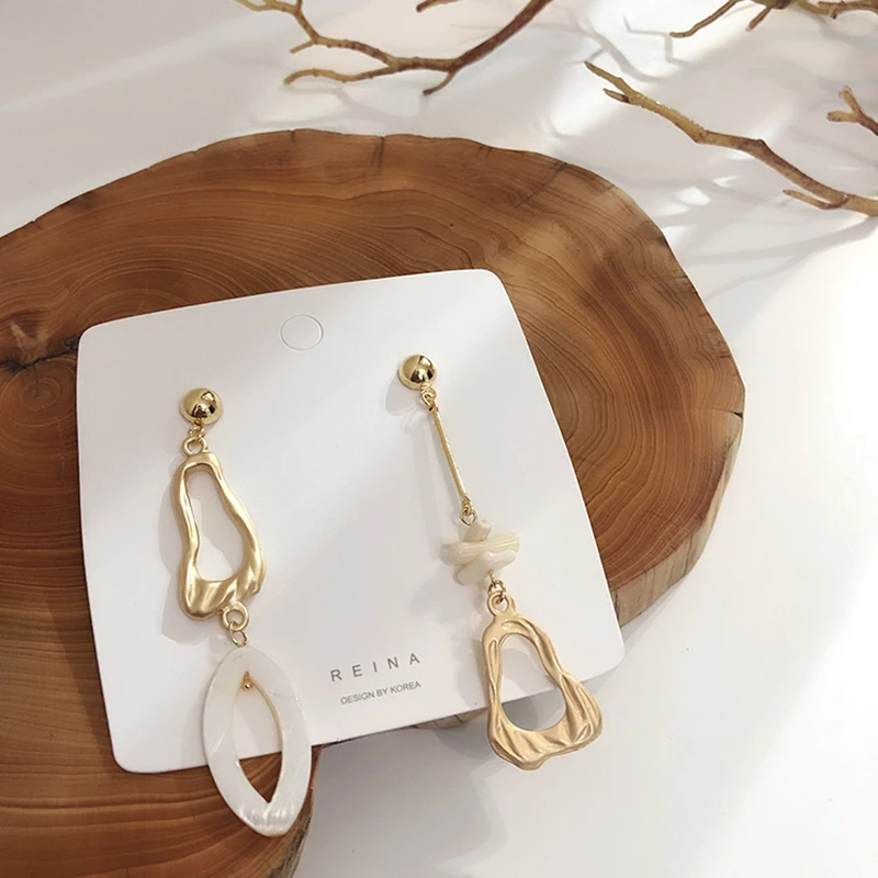 HUANZHI 2019 New Asymmetry Irregular Geometric Hollow Alloy Shell Design Long Drop Earrings for Women Girls Party Jewelry Gifts
HUANZHI 2019 New Asymmetry Irregular Geometric Hollow Alloy Shell Design Long Drop Earrings for Women Girls Party Jewelry Gifts