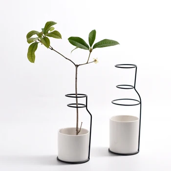 Pack of 2pcs Minimalist Ceramic Flower Vase with Iron Shelf Golden Black Metal Stand Home Decorative White Vase Without Hole
Pack of 2pcs Minimalist Ceramic Flower Vase with Iron Shelf Golden Black Metal Stand Home Decorative White Vase Without Hole