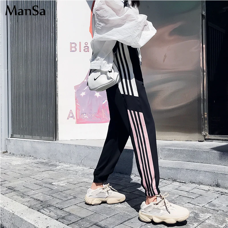 2019 Autumn Spring Casual black Side-stripe Pants Female korean Loose Elastic Waist Chic Pockets joggers Women streetwear Pants
2019 Autumn Spring Casual black Side-stripe Pants Female korean Loose Elastic Waist Chic Pockets joggers Women streetwear Pants