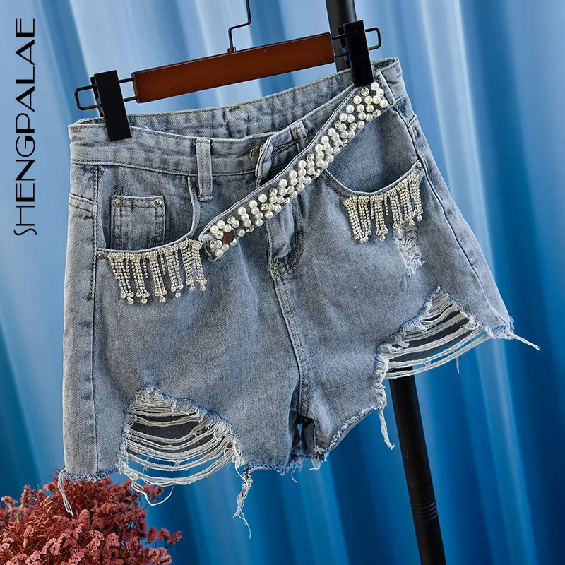 SHENGPALAE 2019 High Quality Heavy Tassels Nail Pearl High Waist New Summer Spring Denim Shorts Woman European Tide FN9400
SHENGPALAE 2019 High Quality Heavy Tassels Nail Pearl High Waist New Summer Spring Denim Shorts Woman European Tide FN9400