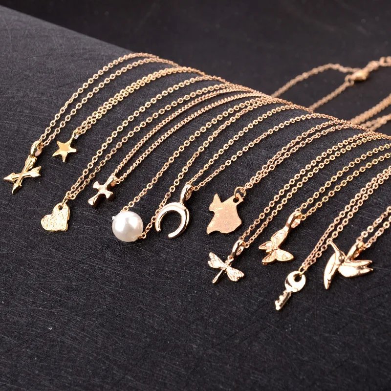 Gold Color Arrow Heart Cross Moon Map Butterfly Bird Dragonfly Star Pearl Pendant Necklace Chain Necklace For Women Without Box
Gold Color Arrow Heart Cross Moon Map Butterfly Bird Dragonfly Star Pearl Pendant Necklace Chain Necklace For Women Without Box