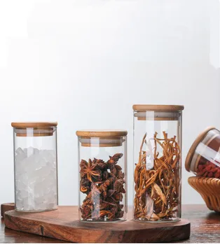 1PC Glass Food Storage Bottle Bamboo Cover Sealed Grains Nuts Tank Can Kitchen Sorting Food Storage Box Container JM 004
1PC Glass Food Storage Bottle Bamboo Cover Sealed Grains Nuts Tank Can Kitchen Sorting Food Storage Box Container JM 004