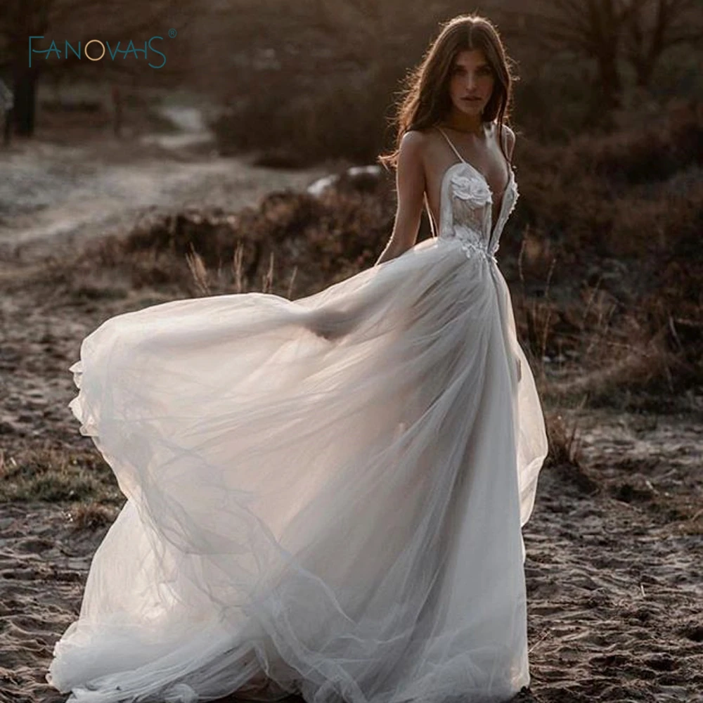 Boho Wedding Dresses Long Deep V Neck Ivory/White Summer Wedding Gown Floral Beaded Open Back Vestido de Novia 2019 WN19
Boho Wedding Dresses Long Deep V Neck Ivory/White Summer Wedding Gown Floral Beaded Open Back Vestido de Novia 2019 WN19
