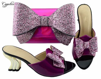 Latest strange style slip on pump shoes and handbag set with bow design for fashion lady YM001A
Latest strange style slip on pump shoes and handbag set with bow design for fashion lady YM001A
