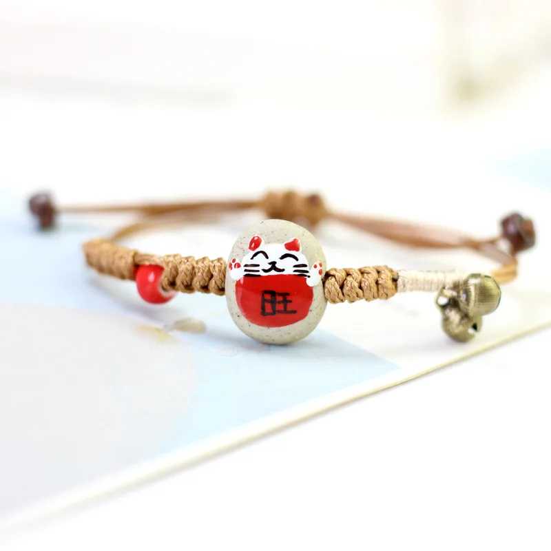 Cute Cartoon Handmade China Ceramic Beads Bell Lucky Cat Pendant Weave Rope Bracelets Women Ethnic Jewelry Accessories
Cute Cartoon Handmade China Ceramic Beads Bell Lucky Cat Pendant Weave Rope Bracelets Women Ethnic Jewelry Accessories