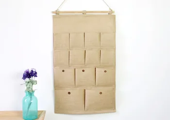 Home fabric decoration 13 pocket plain cotton hanging bag wall storage decoration bag
Home fabric decoration 13 pocket plain cotton hanging bag wall storage decoration bag