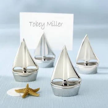 

(18pcs/Lot)FREE SHIPPING+Shining Sails Silver Sailboat Place Card Holder Beach Themed Wedding Favors Table Card Number Holders