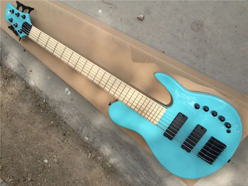 Factory custom 24 frets 6 strings ash seagreen body electric bass guitar with active pickups,black hardware,can be customized
Factory custom 24 frets 6 strings ash seagreen body electric bass guitar with active pickups,black hardware,can be customized
