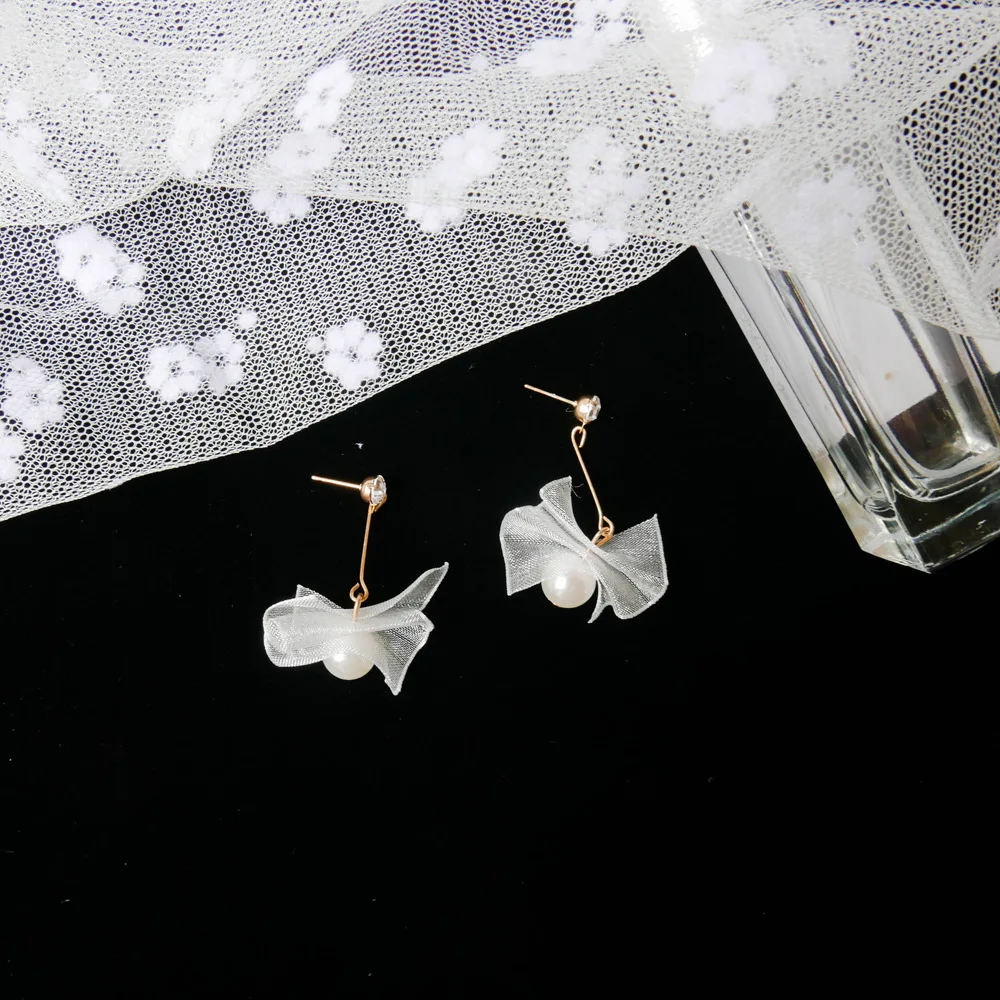 Girl heart Super fairy ribbon bow knot earrings simple mix long earrings new inset red ears
Girl heart Super fairy ribbon bow knot earrings simple mix long earrings new inset red ears