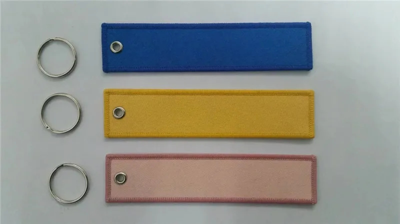 Blank Custom Color Polyester Fabric Embroidery Keychain with Merrow Edge for Gifts, Sports
Blank Custom Color Polyester Fabric Embroidery Keychain with Merrow Edge for Gifts, Sports
