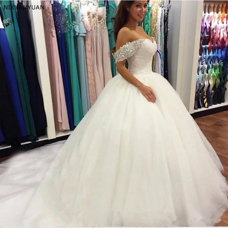Beaded Off Shoulder Ball Gown Wedding Dresses with Court Train Lace Up Wedding Gowns White Ivory Bride Dress Vestido De Noiva
Beaded Off Shoulder Ball Gown Wedding Dresses with Court Train Lace Up Wedding Gowns White Ivory Bride Dress Vestido De Noiva