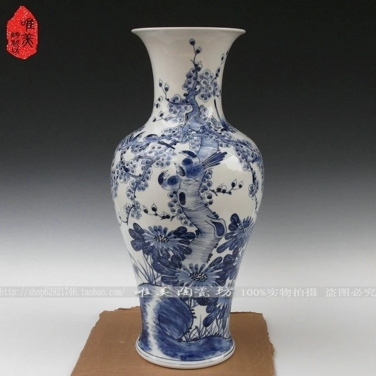 Jingdezhen ceramic floor vase full blue and white fish tail bottle home decoration
Jingdezhen ceramic floor vase full blue and white fish tail bottle home decoration