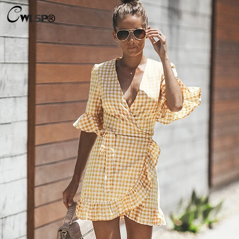 CWLSP Cotton Ruffles Half Sleeve Wrap Dress Orange Plaid Mini Dresses Women Asymmetry Tie up Summer roupas feminina QL4107
CWLSP Cotton Ruffles Half Sleeve Wrap Dress Orange Plaid Mini Dresses Women Asymmetry Tie up Summer roupas feminina QL4107