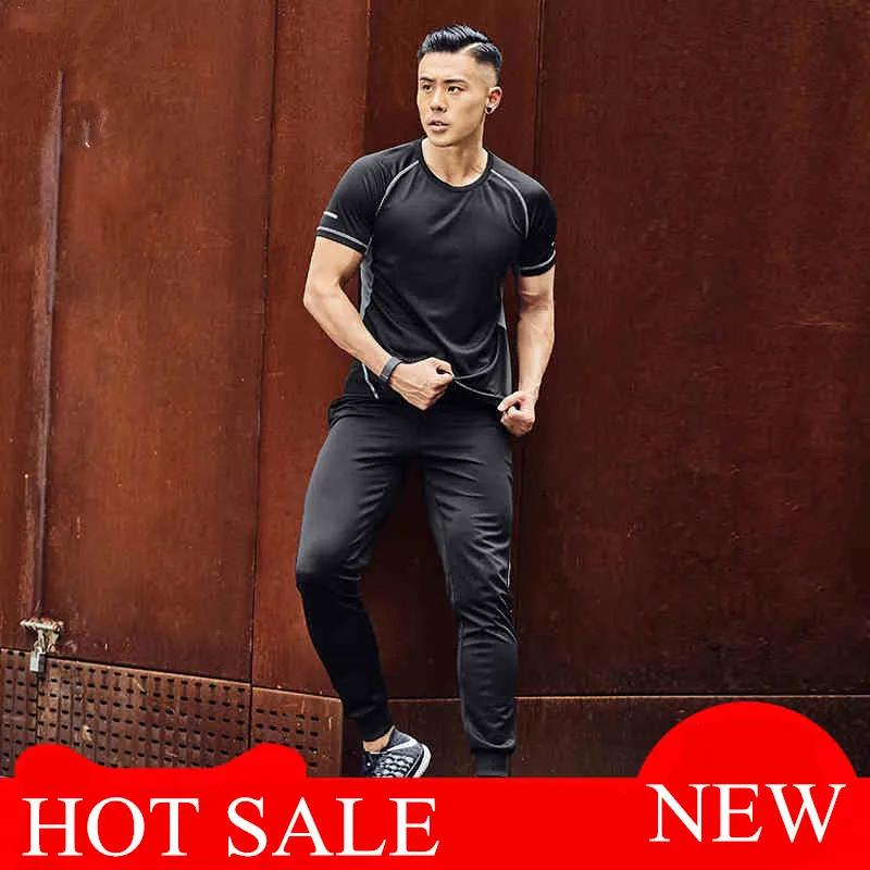 Two Piece Sport Set Running Clothes Men Jogging Training Suits Sweat Sportswear Fitness Gym TShirt Fast Dry Roupas Masculinas
Two Piece Sport Set Running Clothes Men Jogging Training Suits Sweat Sportswear Fitness Gym TShirt Fast Dry Roupas Masculinas