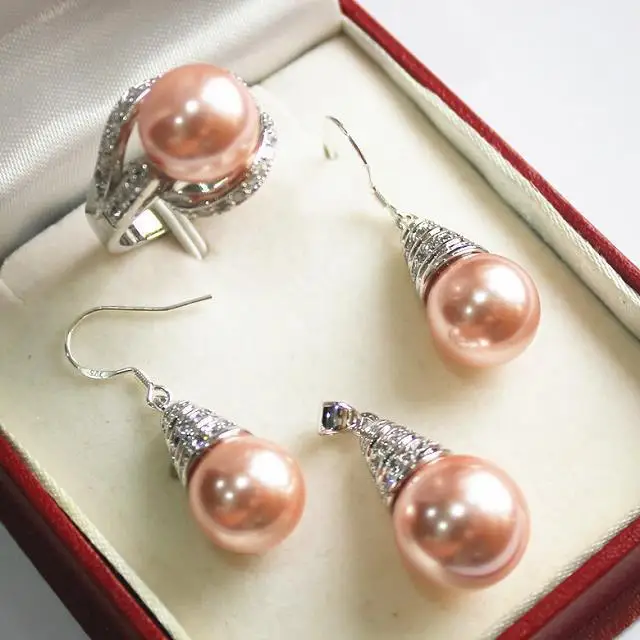 Hot! beautiful new jewelry silver plated + 12mmpink shell pearl pendant, earring, , ring set 5.31
Hot! beautiful new jewelry silver plated + 12mmpink shell pearl pendant, earring, , ring set 5.31