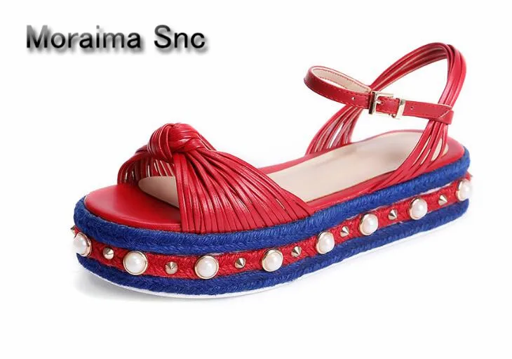 Moraima Snc Brand design women sandals Thick bottom Rivets and pearls decor wedges ladies sandals platform high heels shoes 
Moraima Snc Brand design women sandals Thick bottom Rivets and pearls decor wedges ladies sandals platform high heels shoes