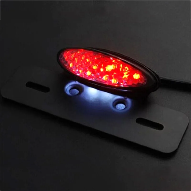 Black Cateye Lens LED Motorcycle Brake Tail Light Lamp License Plate Light for Harley Suzuki Custom Bike Choppers
Black Cateye Lens LED Motorcycle Brake Tail Light Lamp License Plate Light for Harley Suzuki Custom Bike Choppers